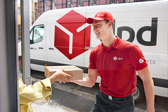 DPD van and driver handing over a parcel