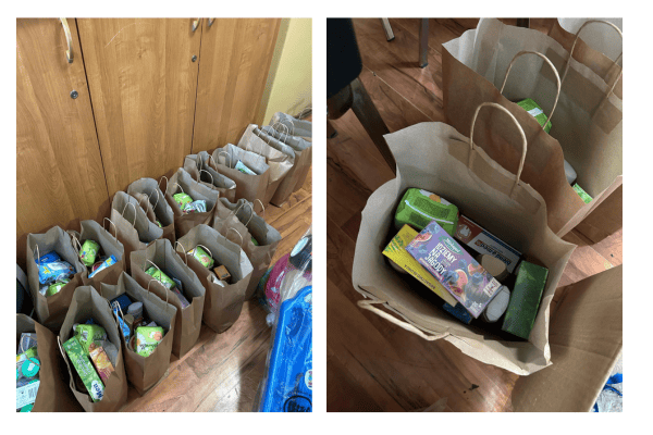 Papierowe torby z produktami spożywczymi i higienicznymi, pomoc humanitarna.