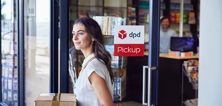 Pickup shop woman picking up parcel 8323